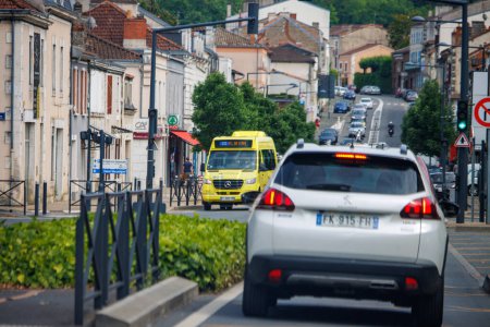 Photo for Perigueux, Dordogne, France June 17 2023 : The Ebb and Flow of City Car Traffic - Royalty Free Image