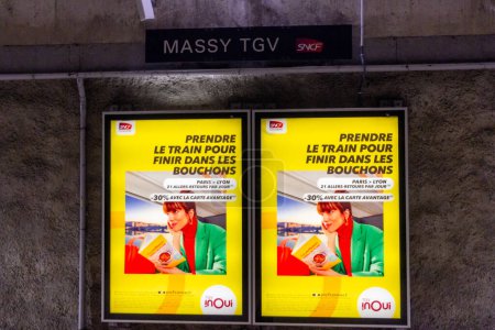 Photo for Ile de France, France October 23, 2023: Travel in Comfort - TGV inOui Advertisement in Massy TGV Station - Royalty Free Image