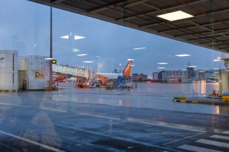 Photo for Ile de France, France October 24, 2023: Pre-Flight Readiness - EasyJet A320 Aircraft Preparation at Charles de Gaulle Airport - Royalty Free Image