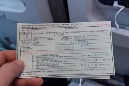 Téléchargez les photos : A320 Finnair, France 24 octobre 2023 : Essentiels d'entrée - Carte de débarquement pour étrangers au Japon - en image libre de droit