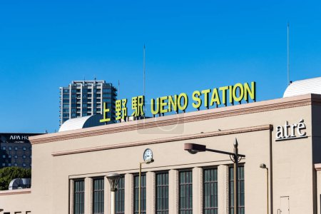 Photo for Tokyo, Japan, 26 October 2023: Ueno Station Signage with Clear Blue Sky - Royalty Free Image