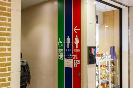 Photo for Tokyo, Japan, 26 October 2023: Public Restroom Signage in a Tokyo Shopping Center - Royalty Free Image