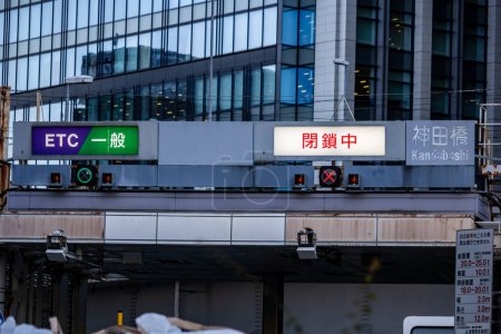 Photo for Tokyo, Japan, 26 October 2023: ETC System Sign Over a Busy Highway in Tokyo - Royalty Free Image