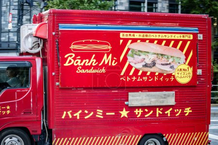 Photo for Tokyo, Japan, 26 October 2023: Colorful Food Delivery Truck Promoting Banh Mi Sandwiches - Royalty Free Image