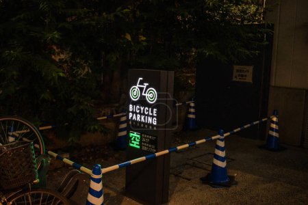 Photo for Tokyo, Japan, 27 October 2023 : Designated bicycle parking area at night - Royalty Free Image