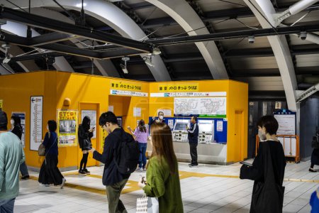 Photo for Tokyo, Japan, 27 October 2023: Commuters using vending machines at Tokyo subway station - Royalty Free Image