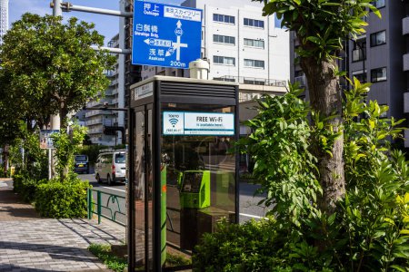 Photo for Tokyo, Japan, 28 October 2023: Bus stop with free Wi-Fi service in Tokyo's urban area - Royalty Free Image