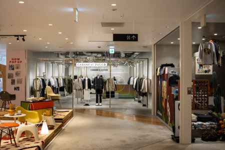 Photo for Tokyo, Japan, 29 October 2023 : Wide view of a modern and spacious clothing store interior - Royalty Free Image