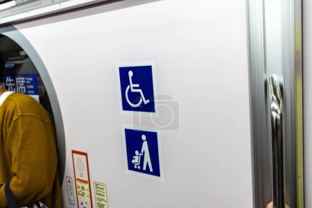 Photo for Tokyo, Japan, 29 October 2023: Accessibility signs inside a Tokyo subway train - Royalty Free Image