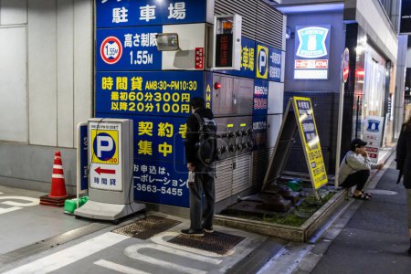 Photo for Tokyo, Japan, 29 October 2023: Automated Multi-Level Parking Entrance with Information Signage - Royalty Free Image