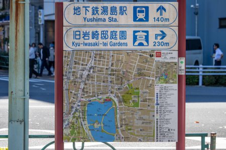 Photo for Tokyo, Japan, 30 October 2023: Informative map signpost near Yushima Station - Royalty Free Image