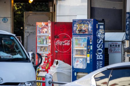 Photo for Tokyo, Japan, 30 October 2023: Line of vending machines on a Tokyo sidewalk - Royalty Free Image