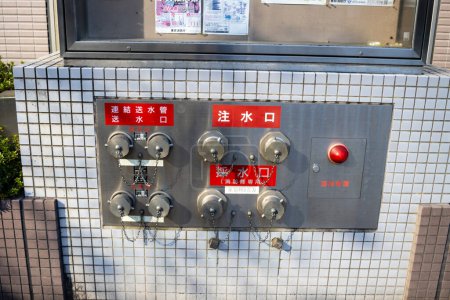 Photo for Tokyo, Japan, 30 October 2023: Fire department emergency services connection points on a building - Royalty Free Image