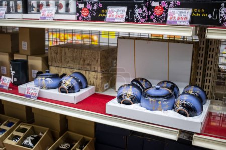 Photo for Tokyo, Japan, 30 October 2023 : Display of Japanese ceramic bowls in a traditional craft store - Royalty Free Image