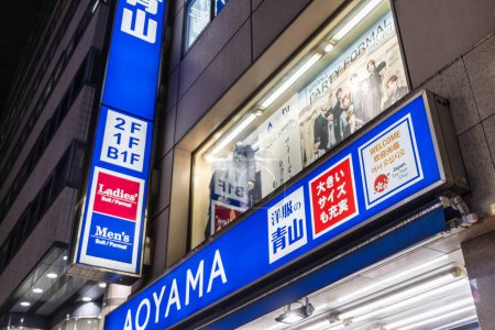 Photo for Tokyo, Japan, 30 October 2023: Entrance to Aoyama tailor shop with directional signs - Royalty Free Image