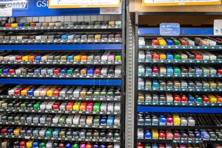Photo for Tokyo, Japan, 30 October 2023: Wide selection of spray paints for models on display - Royalty Free Image