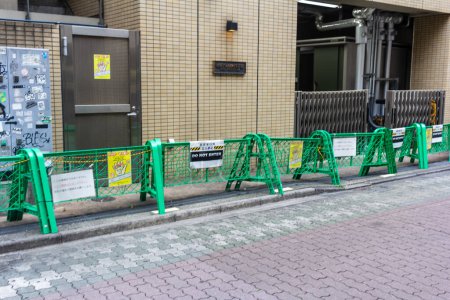 Photo for Tokyo, Japan, 31 October 2023: Restricted Area with Barricades in Urban Setting - Royalty Free Image
