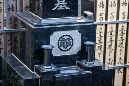 Photo for Tokyo, Japan, 1 November 2023: Traditional Japanese Cemetery with Family Crests - Royalty Free Image