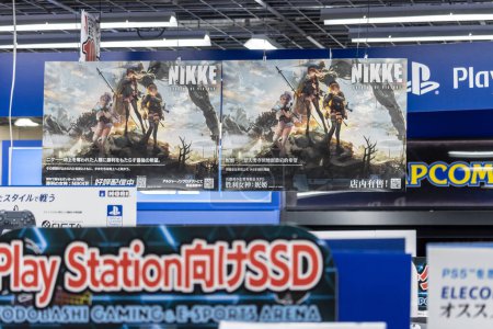 Photo for Tokyo, Japan, 2 November 2023: Advertisement for NIKKE game at a gaming and esports arena - Royalty Free Image