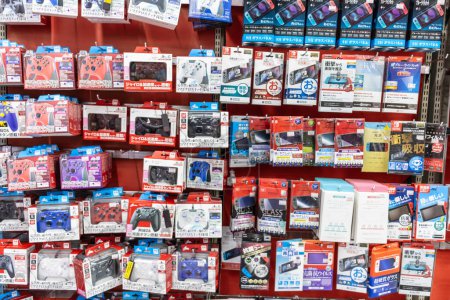 Photo for Tokyo, Japan, 2 November 2023: Electronic store display with various game consoles - Royalty Free Image
