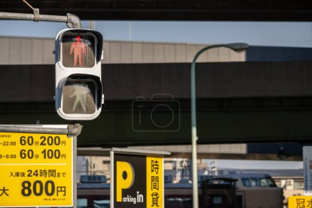 Photo for Tokyo, Japan, 3 November 2023: Traffic lights with pedestrian figures in Shibuya - Royalty Free Image