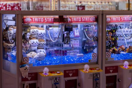 Photo for Tokyo, Japan, 3 November 2023: TAITO Station claw machine with plush toys - Royalty Free Image