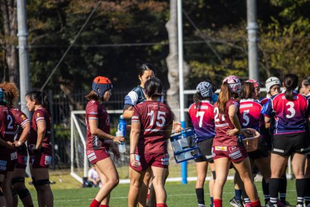 Photo for Tokyo, Japan, 4 November 2023: Women's Rugby Team Gathering During a Match Break - Royalty Free Image