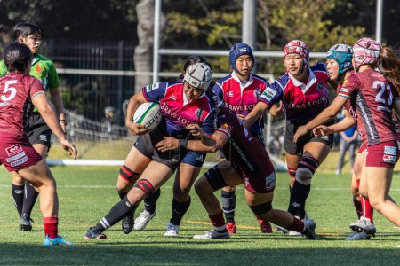 Photo for Tokyo, Japan, 4 November 2023: Intense Moment at a Women's Rugby Match - Royalty Free Image
