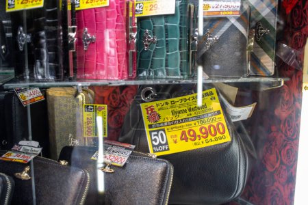 Photo for Tokyo, Japan, November 4, 2023: Designer Handbags on Display in a Tokyo Store - Royalty Free Image