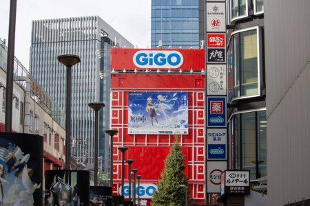 Photo for Tokyo, Japan, 6 November 2024 : Urban Street View with GIGO Arcade and Anime Billboard - Royalty Free Image
