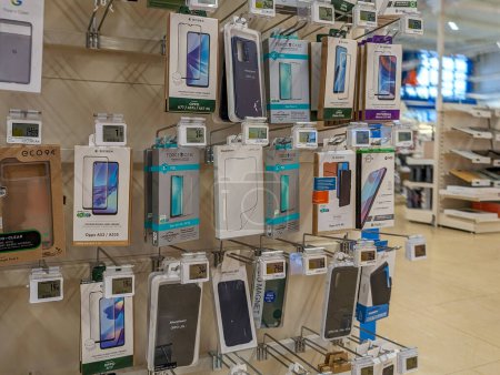 Photo for France, 2 March 2024: Smartphone cases display in electronics store - Royalty Free Image