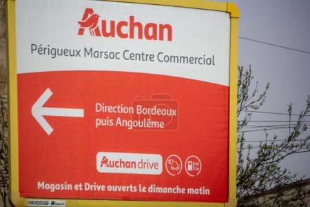 Photo for France, 30 March 2024: Directional Signage to Auchan Shopping Center - Royalty Free Image