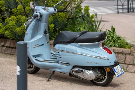 Photo for France, 30 March 2024: Vintage Blue Scooter Parked Outdoors - Royalty Free Image