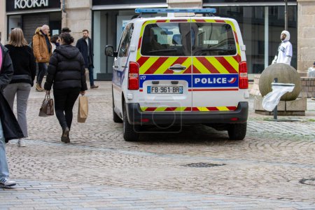 Photo for France, 30 March 2024: Police vehicle patrolling in a busy street - Royalty Free Image