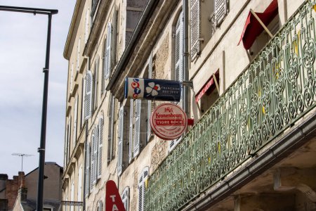 Photo for France, 10 March 2024: Streets of Perigueux, showcasing Kronenbourg Tigre Bock sign - Royalty Free Image