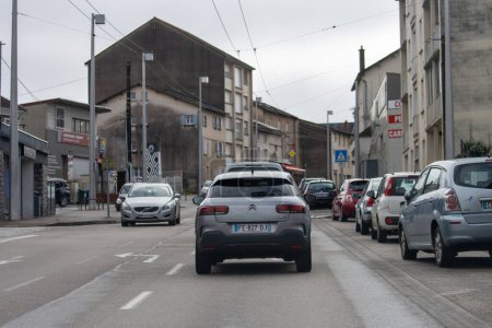 Photo for France, 30 March 2024: Urban street scene with cars and buildings - Royalty Free Image