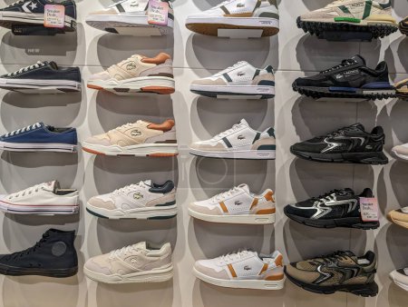 Photo for France, 08 May 2024: Display of various sneakers in a shoe store - Royalty Free Image