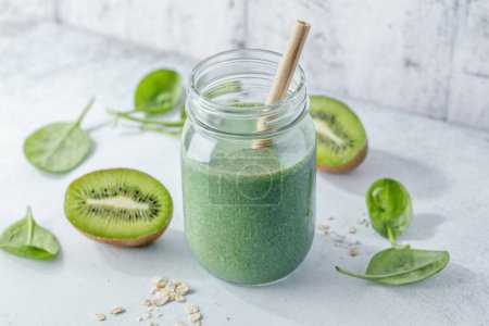 Photo for Green smoothie in jar with fruits. Closeup. - Royalty Free Image