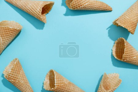 Foto de Ice cream cones on color background. Conceptual food. Top View - Imagen libre de derechos