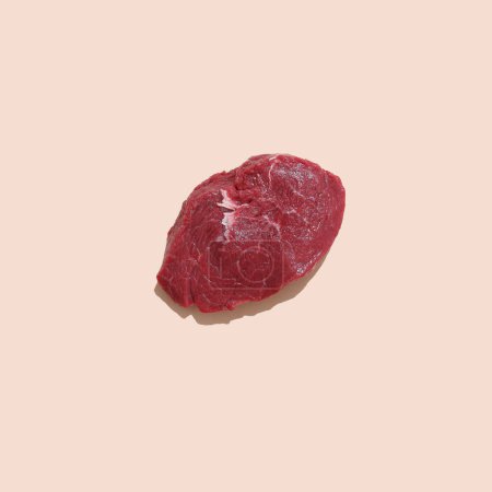Foto de Raw meat on color background ready for cooking. Food concept. - Imagen libre de derechos