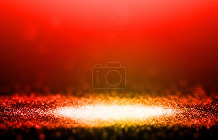 Téléchargez les photos : Gold sparkle rays glitter lights with spotlight bokeh elegant show on stage abstract background. Dust sparks background.Spotlight background - en image libre de droit