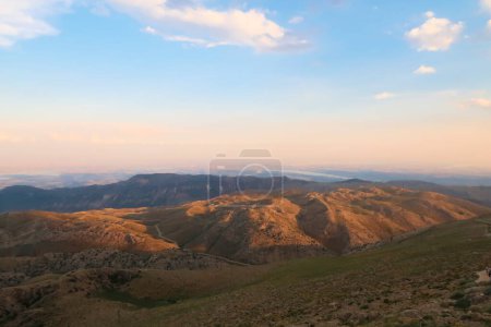 View from Mount Nemrut onto the surrounding landscape before sunset, the Ataturk Reservoir is visible in the background, close to Adiyaman, Turkey 2022
