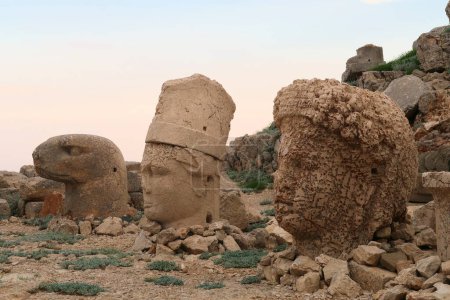 Heads of stone statues, sculptures on the East Terrace of Mount Nemrut, heads of an eagle, King Antiochus and the Goddess of Commagene, close to Adiyaman, Turkey 2022