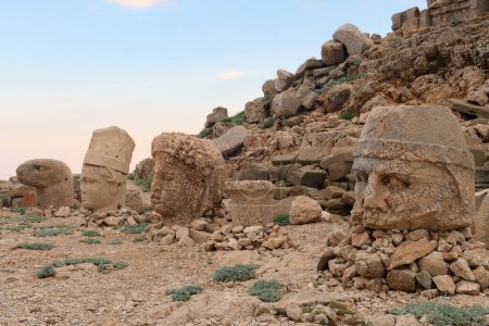 Heads of stone statues, sculptures on the East Terrace of Mount Nemrut, heads of an eagle, King Antiochus, the Goddess of Commagene and Zeus, close to Adiyaman, Turkey 2022