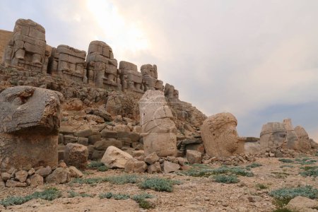 Heads of stone statues, sculptures on the East Terrace of Mount Nemrut, heads of an eagle, King Antiochus, the Goddess of Commagene, Zeus, Apollon, Heracles, close to Adiyaman, Turkey 2022