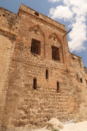 Facade of a traditional house in the old town of Mardin, Turkey 2022