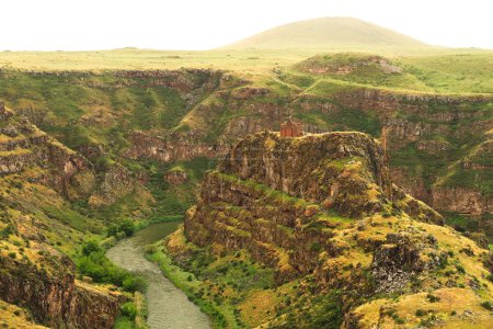 Spectacular view on the promontory encircled by the canyon of the Akhurian River with the ruins of the Church of Saint Elia, Zakares Church on top, last remaining building of the Kizkale, Kiz Kalesi, Maidens, Virgins Castle, ancient site of Ani, Kars