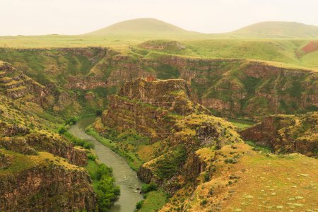 Beautiful view on the promontory encircled by the canyon of the Akhurian River with the ruins of the Church of Saint Elia, Zakares Church on top, last remaining building of the Kizkale, Kiz Kalesi, Maidens, Virgins Castle, ancient site of Ani, Kars, 