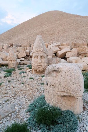 Heads of stone statues, sculptures on the West Terrace of Mount Nemrut, heads Apollo, Zeus and an eagle, close to Adiyaman, Turkey 2022
