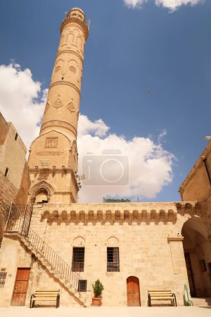 The facade and minaret of the Great, Grand Mosque, Ulu Camii in the old town of Mardin, Turkey 2022